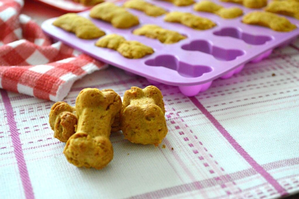 This recipe is SO EASY and so simple it'll make your head spin. With only a few ingredients that cost next to nothing, like a carrot and an apple, these homemade peanut butter dog treats will easily become a staple goodie to give your dog. Plus, they'll absolutely devour these chewy, baked biscuits!